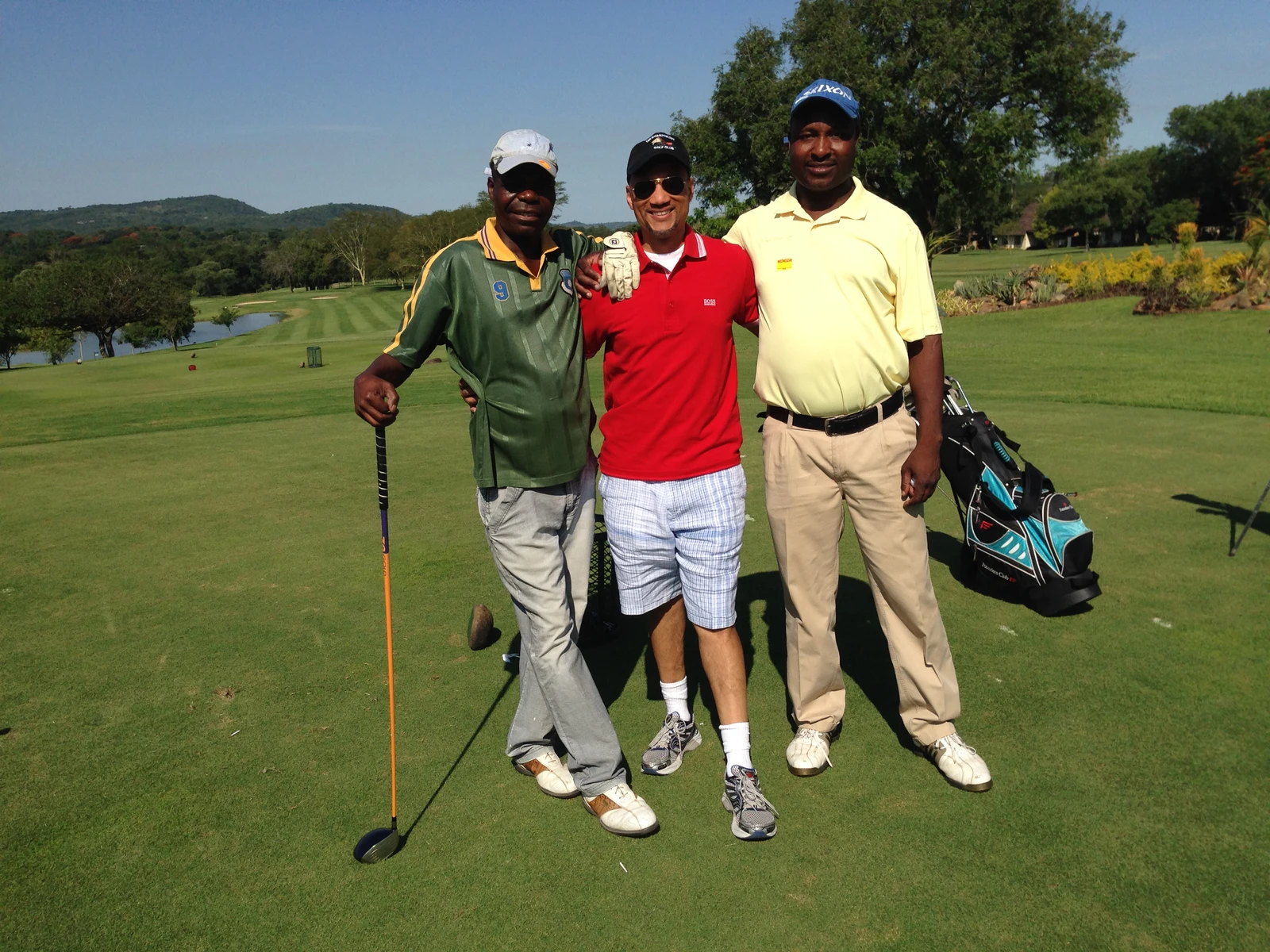 Loren Grant golfing with the resort's Golf Pro in South Africa, 2014